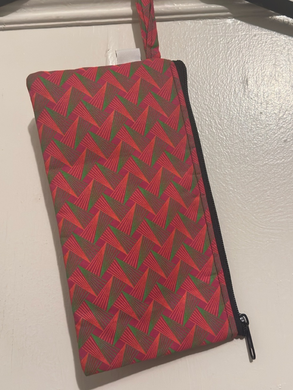 Like New Unisex Red Geometric Wristlet Pouch - Unbranded. 5”H x 9”W.